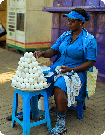 Ghanaian market woman selling eggs