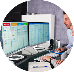 Engineer monitoring screens